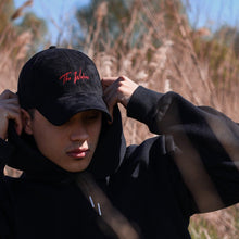 Load image into Gallery viewer, Suede black baseball cap with red handwritten logo